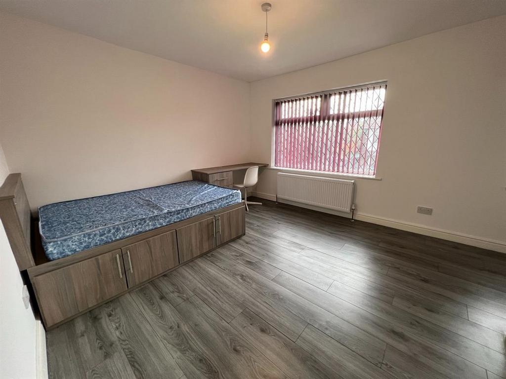Bright, recently updated bedroom with laminate ...