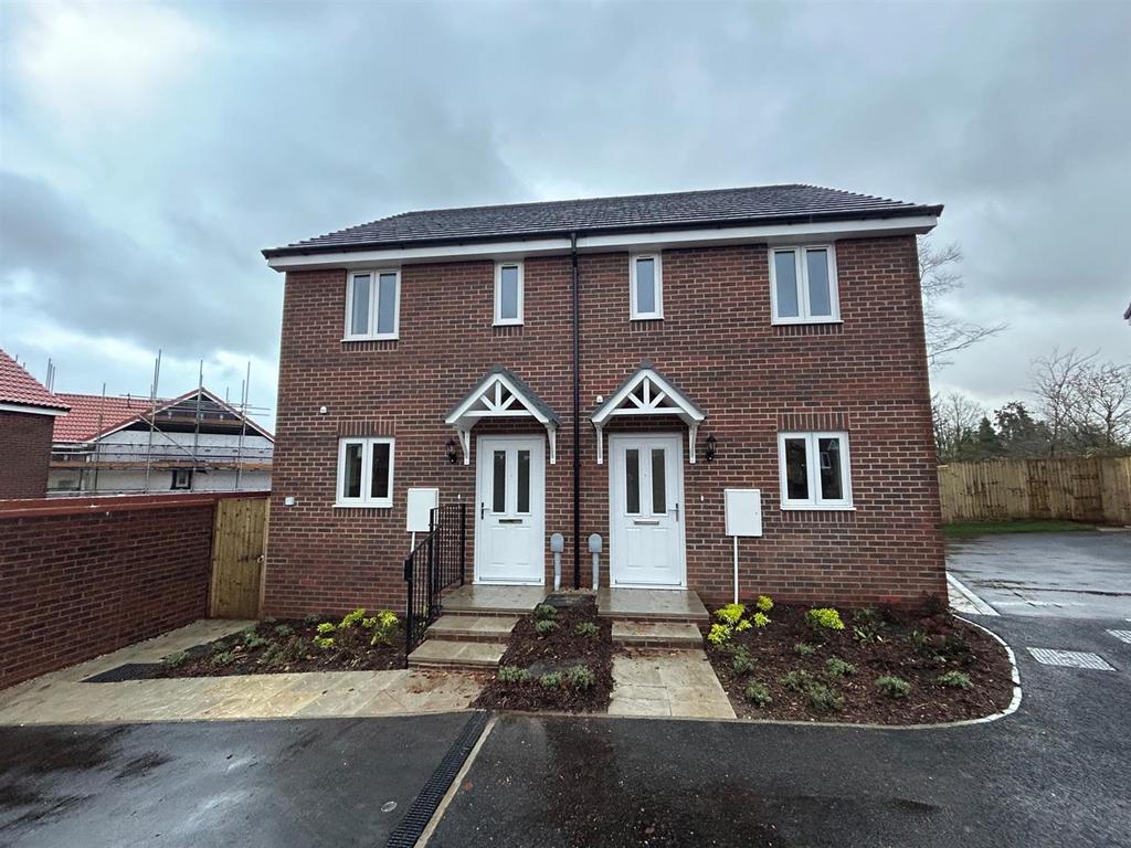 Front Photo is an Image of a Two Bedroom Semi Deta