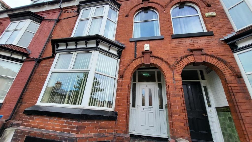 Attractive red-brick terraced property with a b...