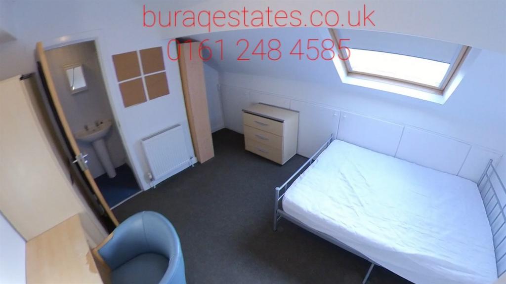 Bright attic-style single bedroom with a raised...