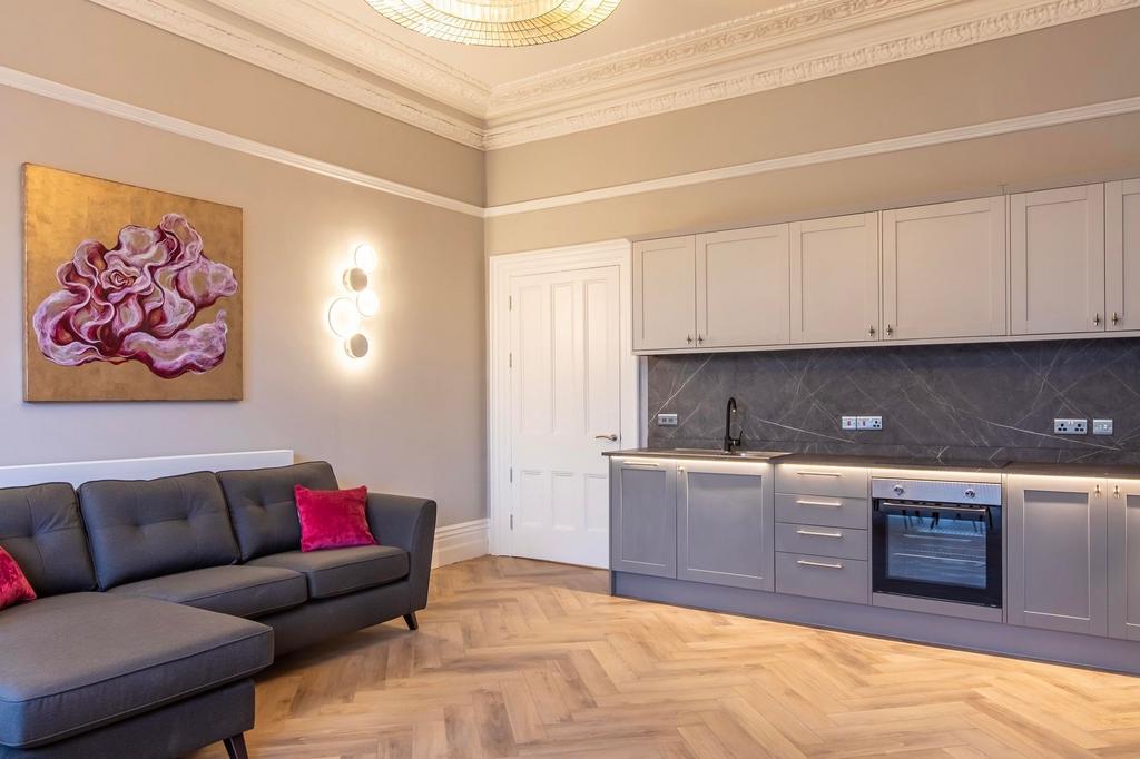 Stylish open-plan living area with a modern gre...
