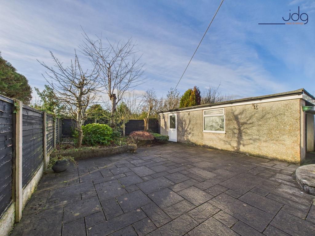 Spacious Flagged Garden and Garage