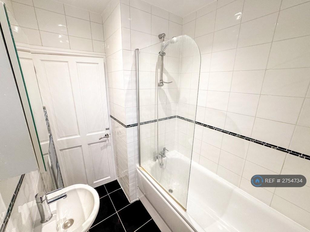 Bathroom With Shower Over Bath