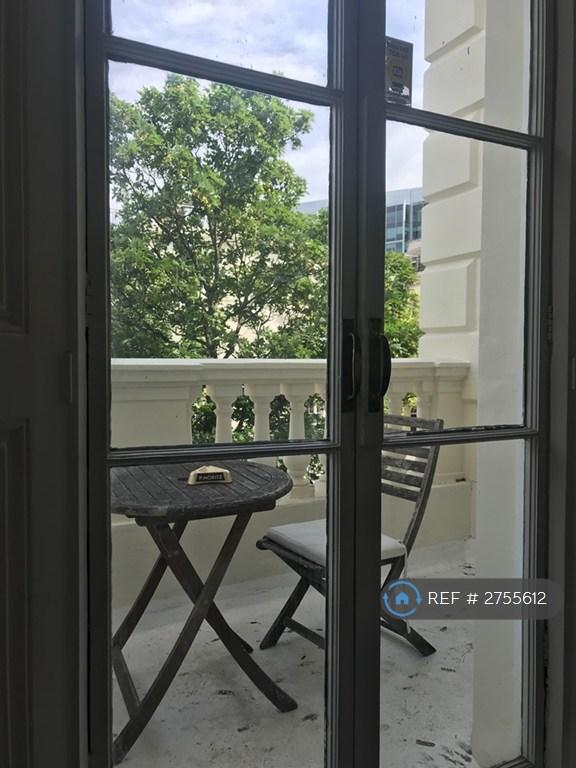 French Doors In Kitchen Leading To Terrace