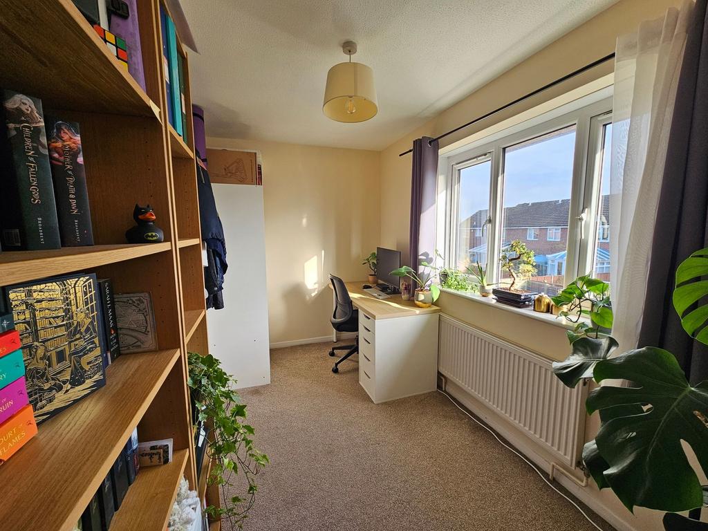Bright, neatly arranged workspace with a large ...