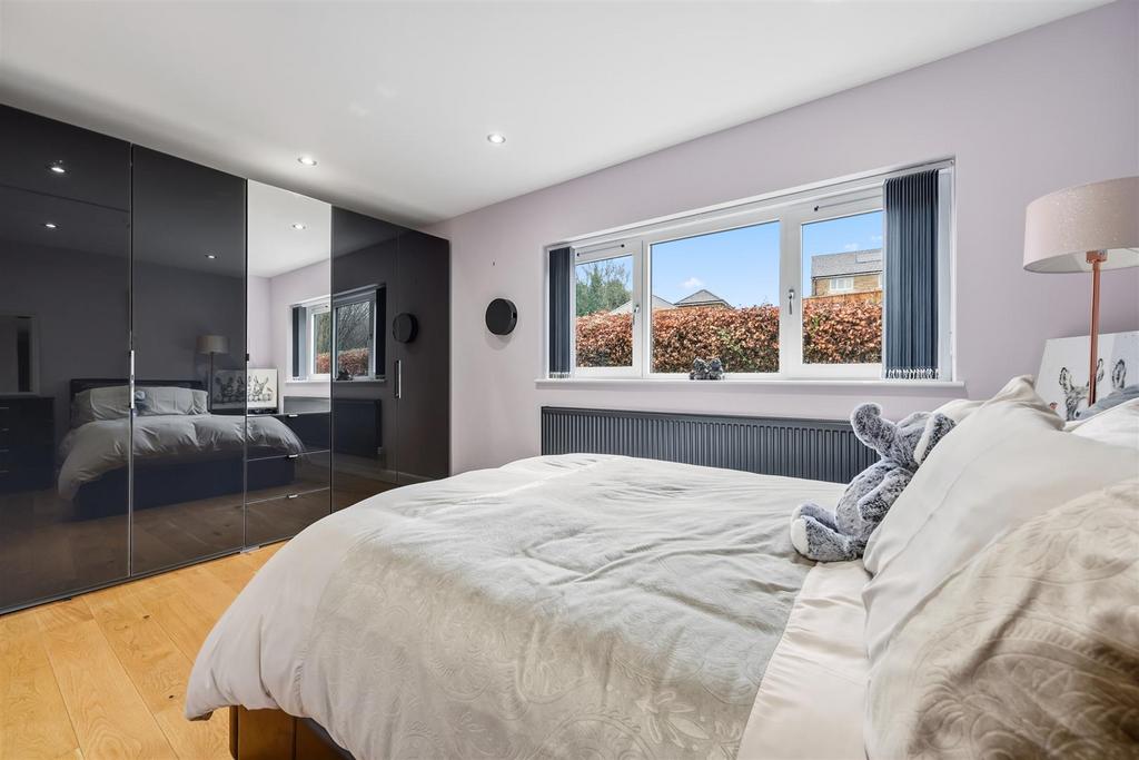 Bedroom One to window and wardrobes.jpg