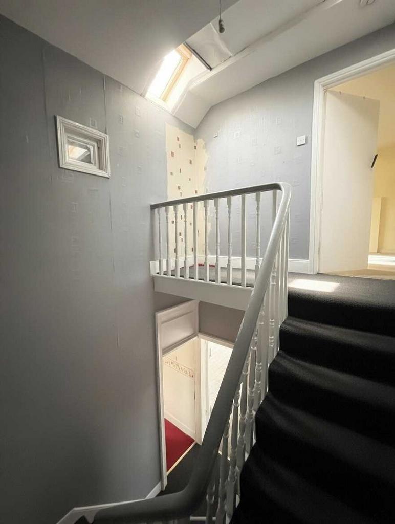 Stairs to top floor