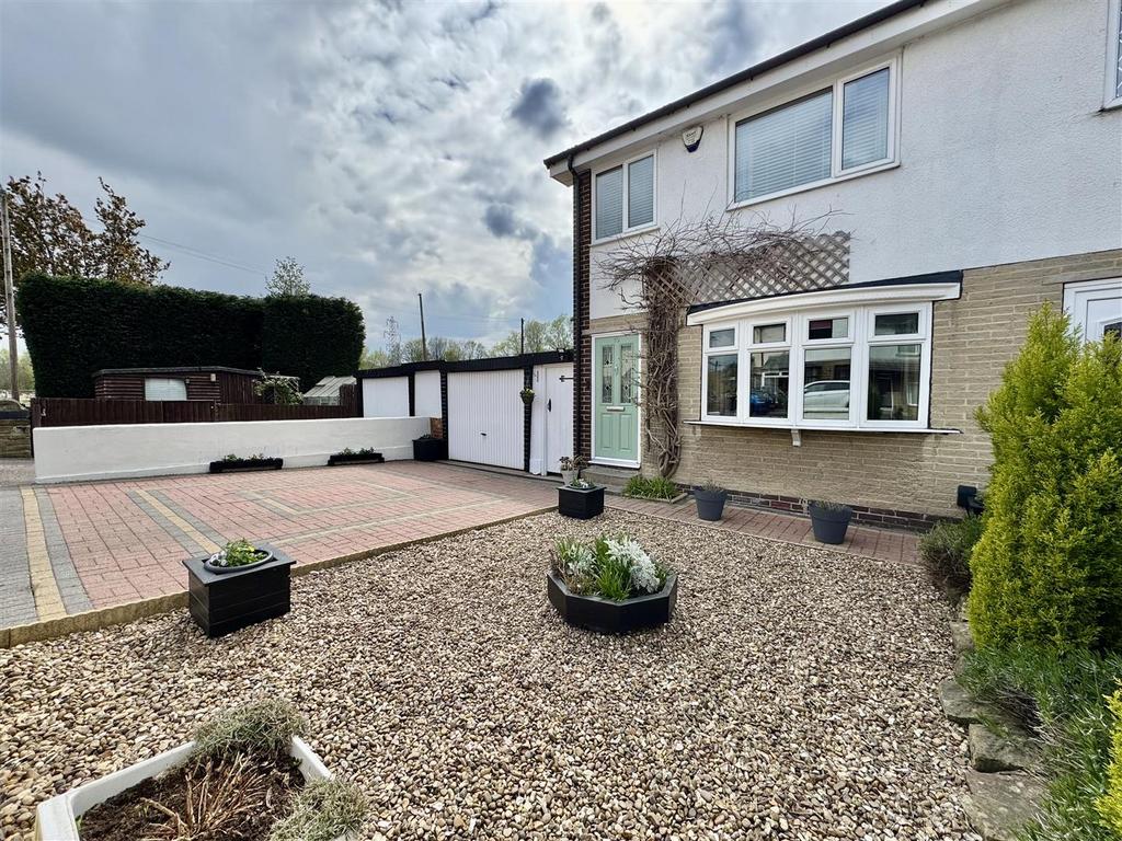 External front, garage and driveway