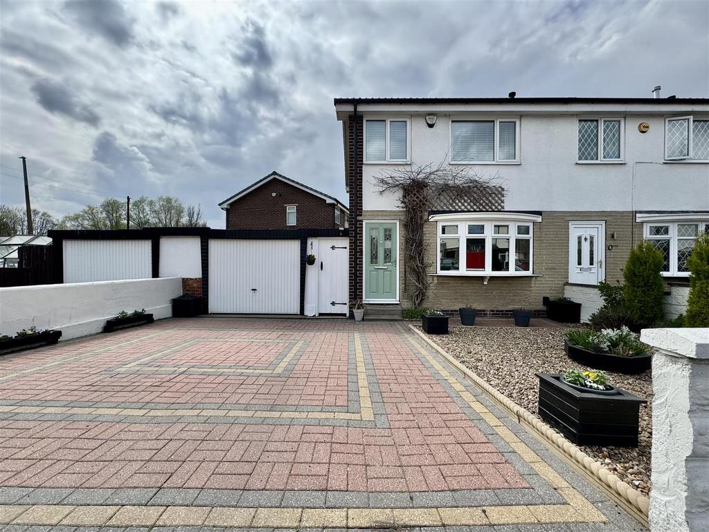 External front, garage and driveway