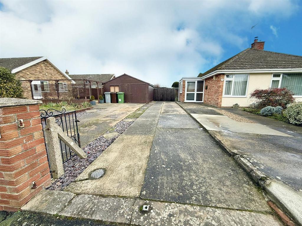 Driveway to the rear