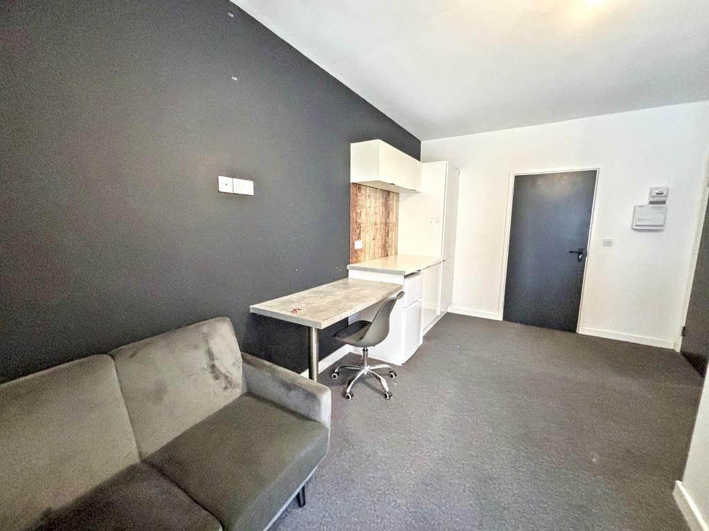 Bright, well-presented studio living area with ...