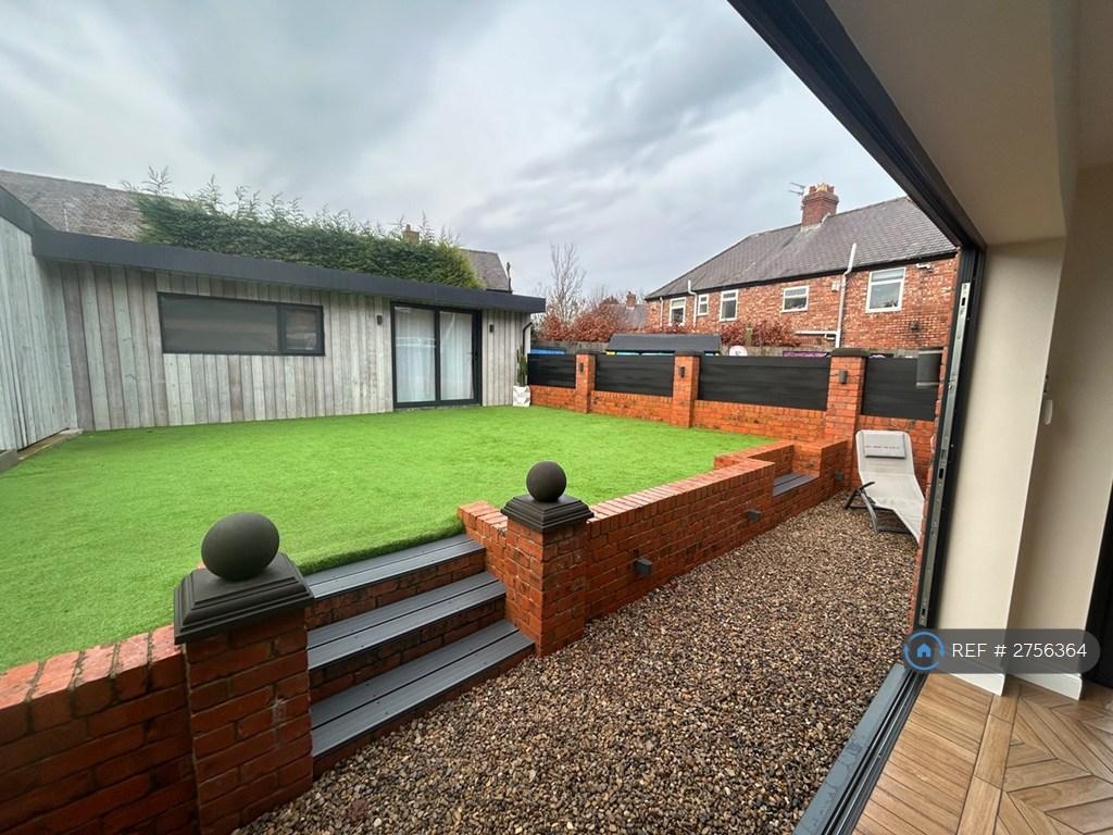 Rear Garden With Outhouse
