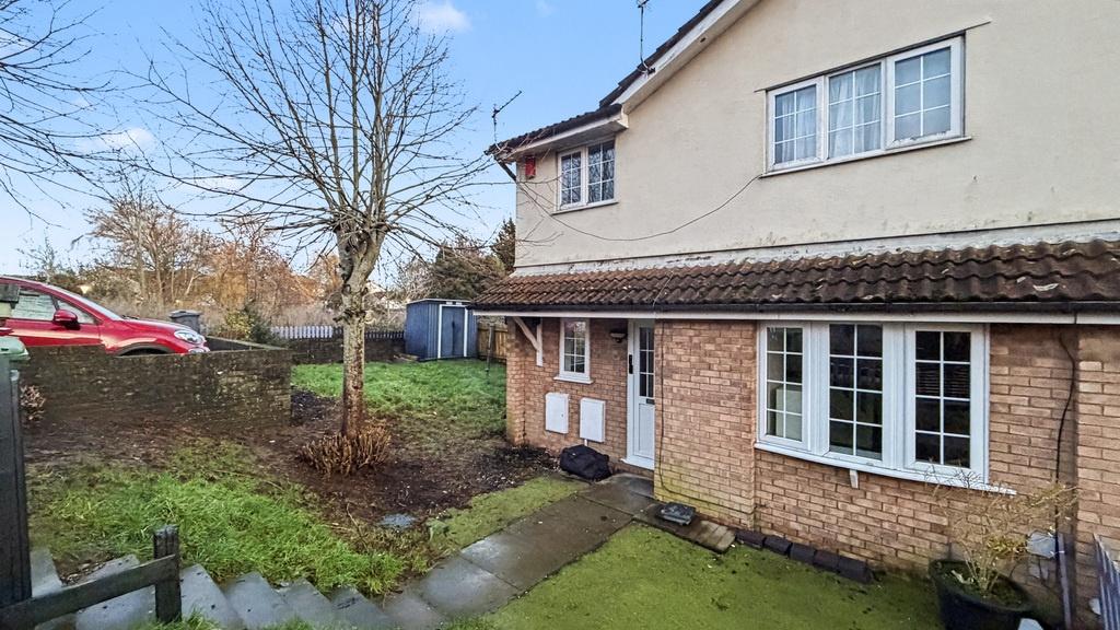 Exterior view of a semi-detached house with a n...