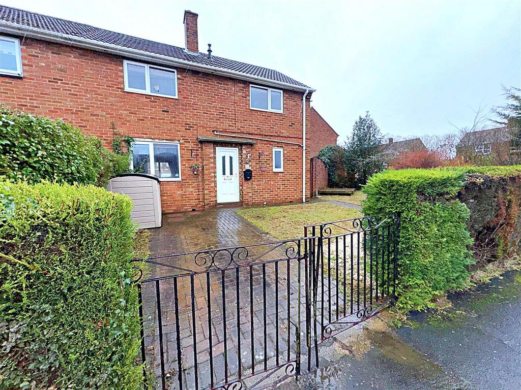 NEW Front of property jan 26.jpg