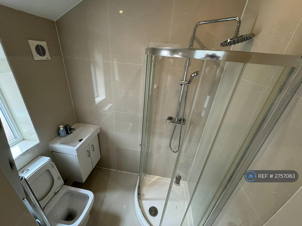 Bathroom With Waterfall Shower