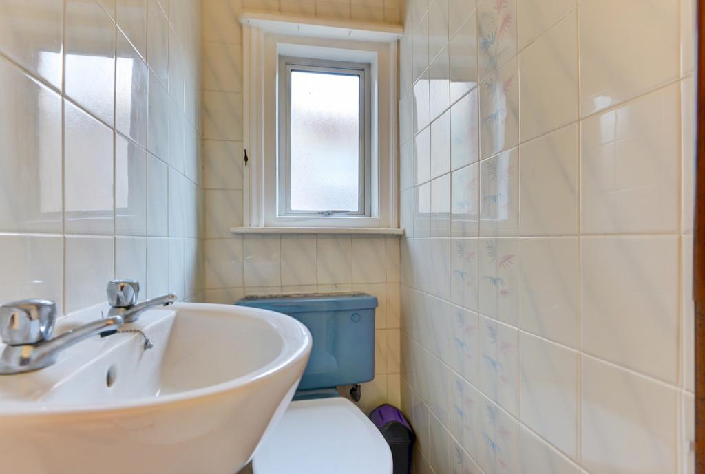 Neat bathroom with a compact layout featuring a...