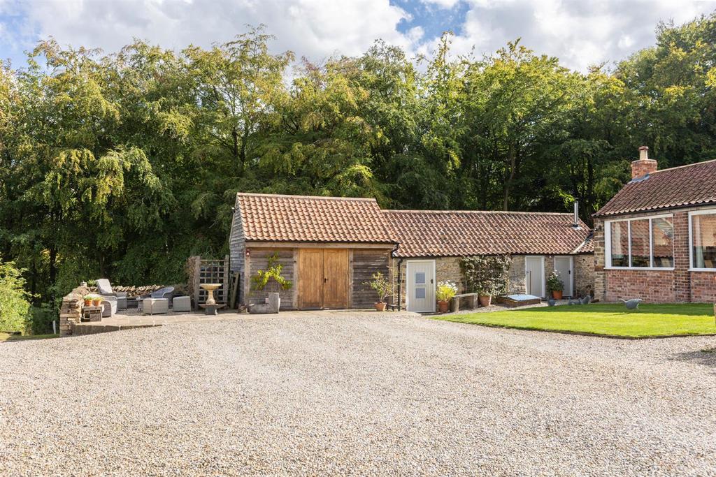 Outbuildings and Patio Area