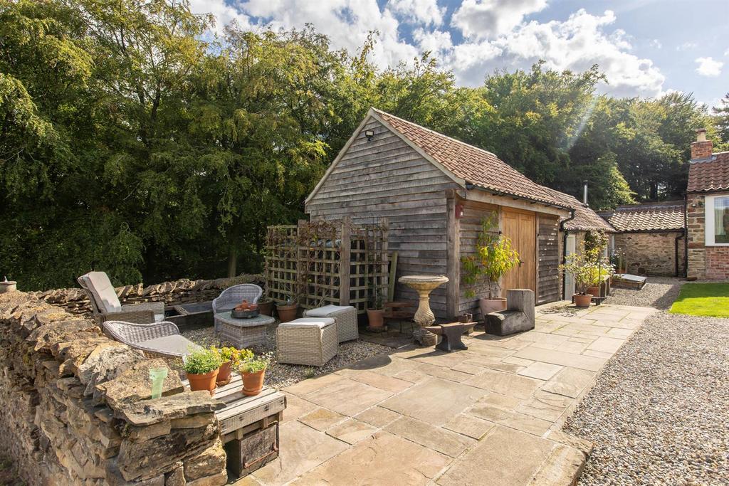 Outbuildings and Patio Area
