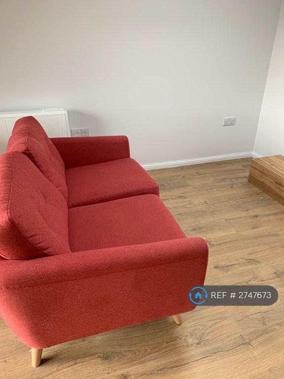 Living Area With Sofa And Tv Unit