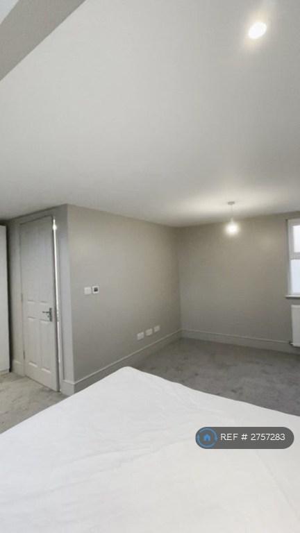 Living Area Leading To Kitchen/Bathroom