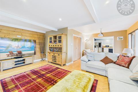 undefined, 'A statement 4,161 sq. ft. detached residence with four double bedrooms & two annexes'