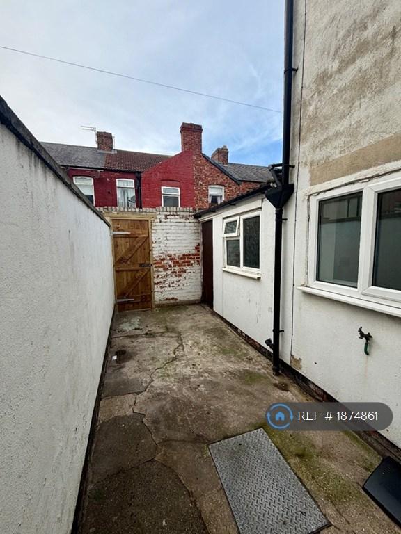 Rear Court Yard And Outhouse