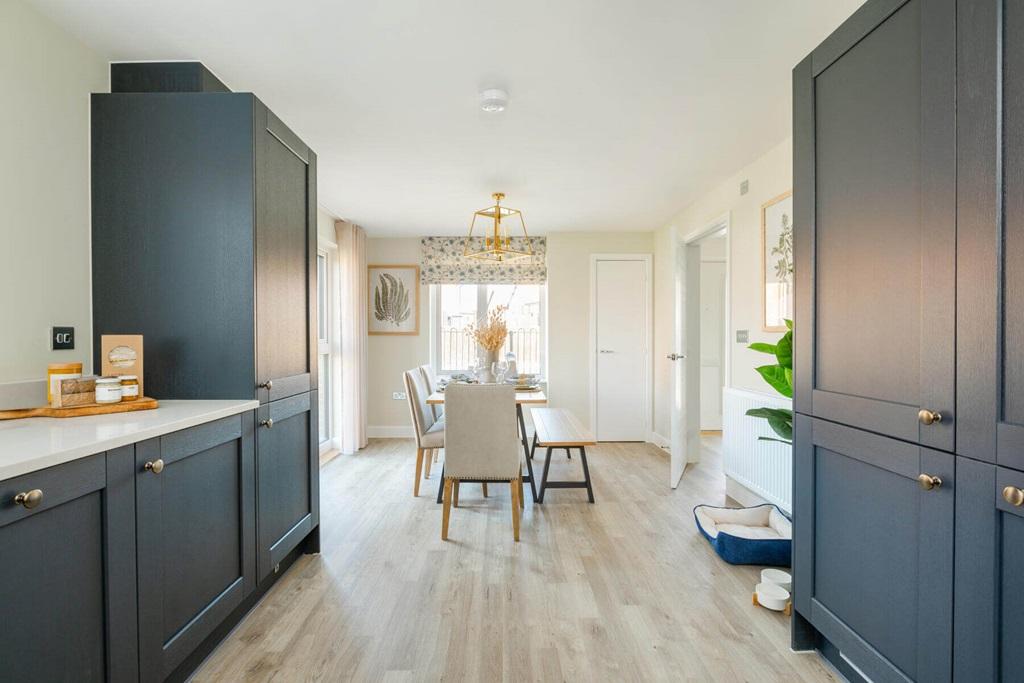 The dining area lead from the kitchen through...