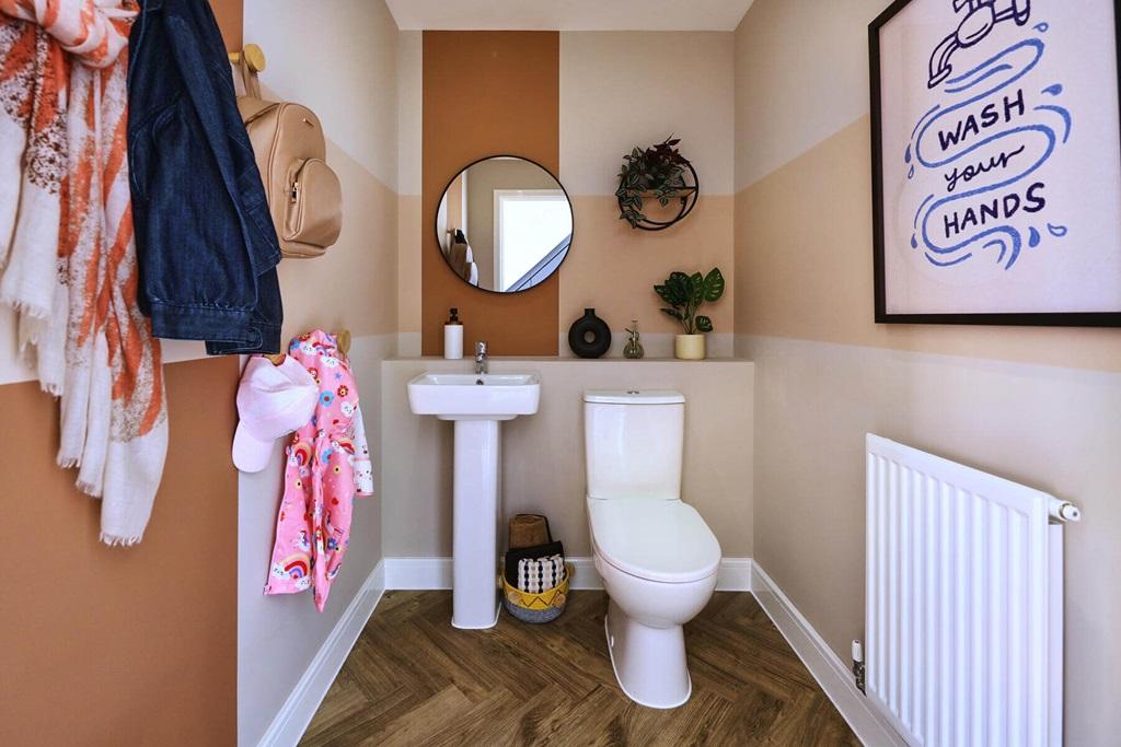 A guest cloakroom completes the ground floor