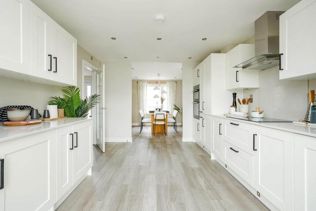 The open plan kitchen and dining area makes...