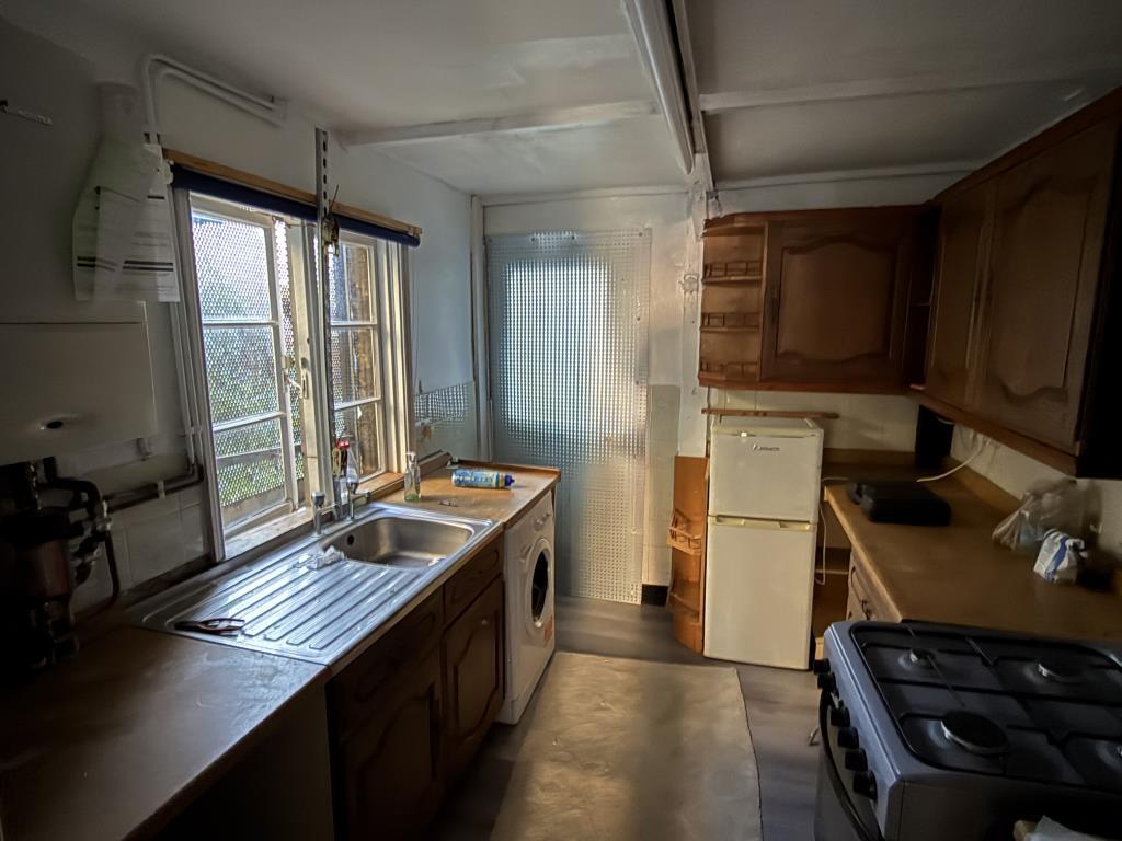 Kitchen in House in Need of Refurbishment