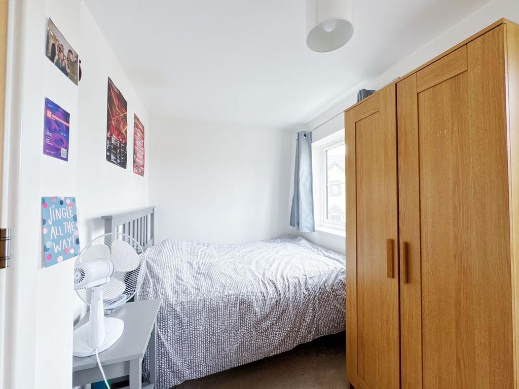 Bright, tidy bedroom with a double bed, large w...
