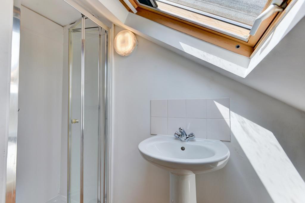 A clean and well-maintained bathroom with a lar...