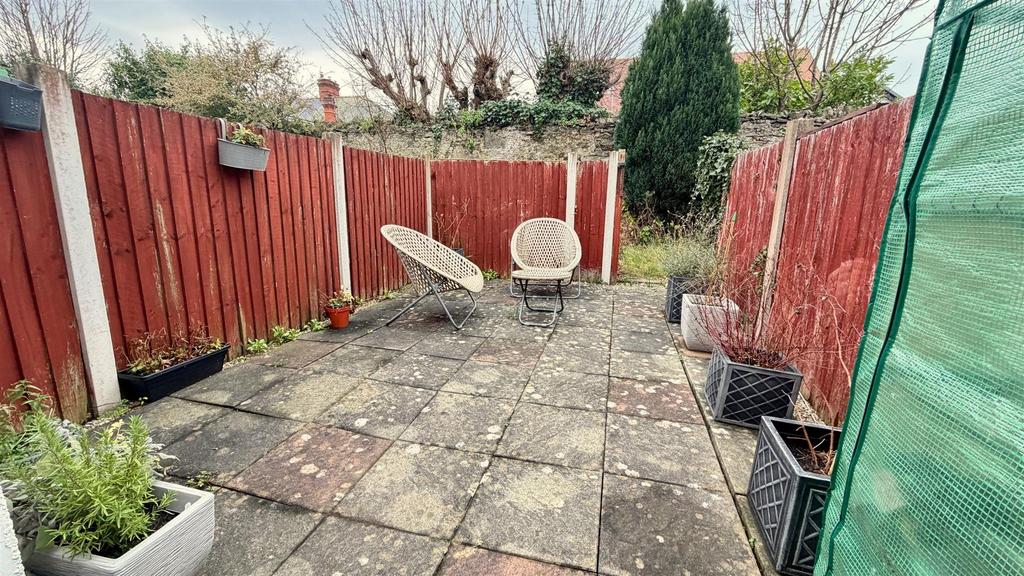 Paved rear courtyard