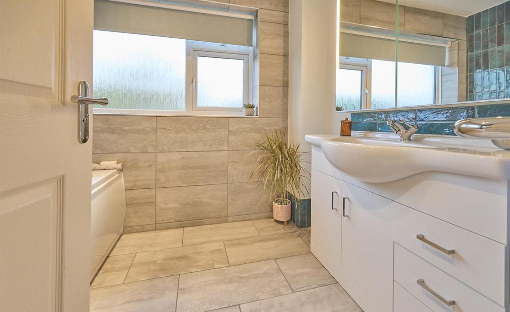 Refitted family bathroom to rear
