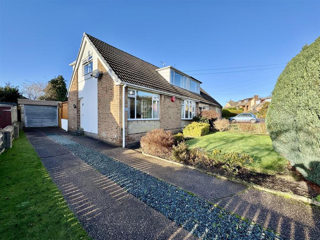 External front, garage and driveway