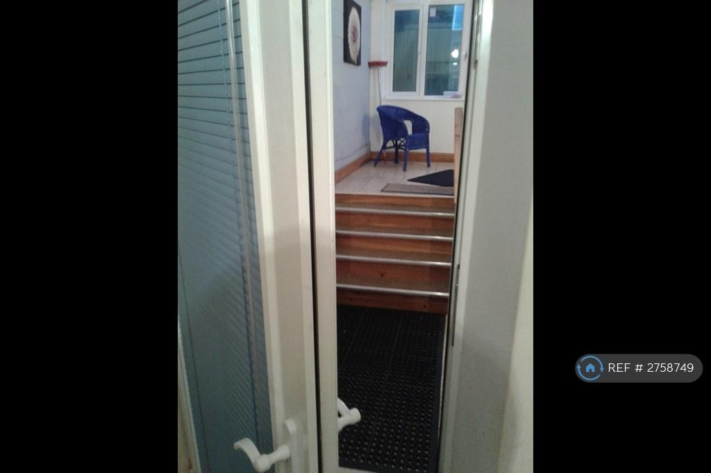 Door Into Conservatory.