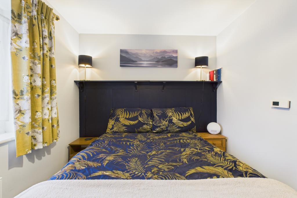 Bedroom 1 full of colour and character