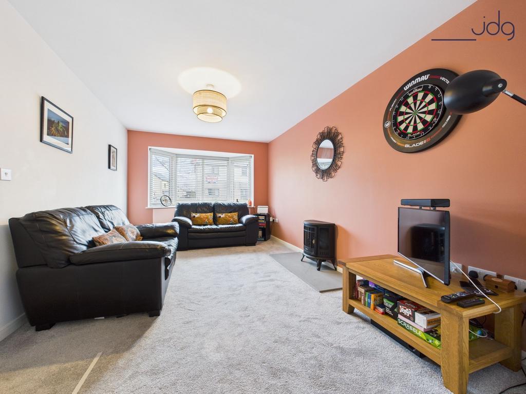 Cosy Lounge with Entrance to the Open Plan...
