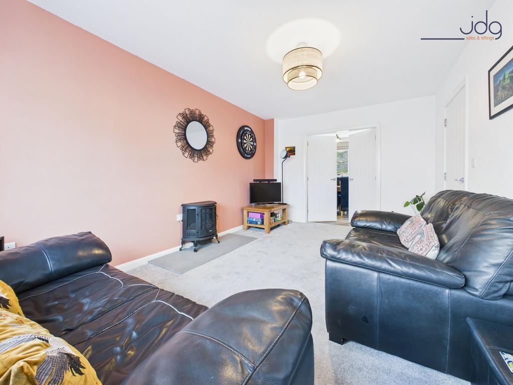 Cosy Lounge with Entrance to the Open Plan...