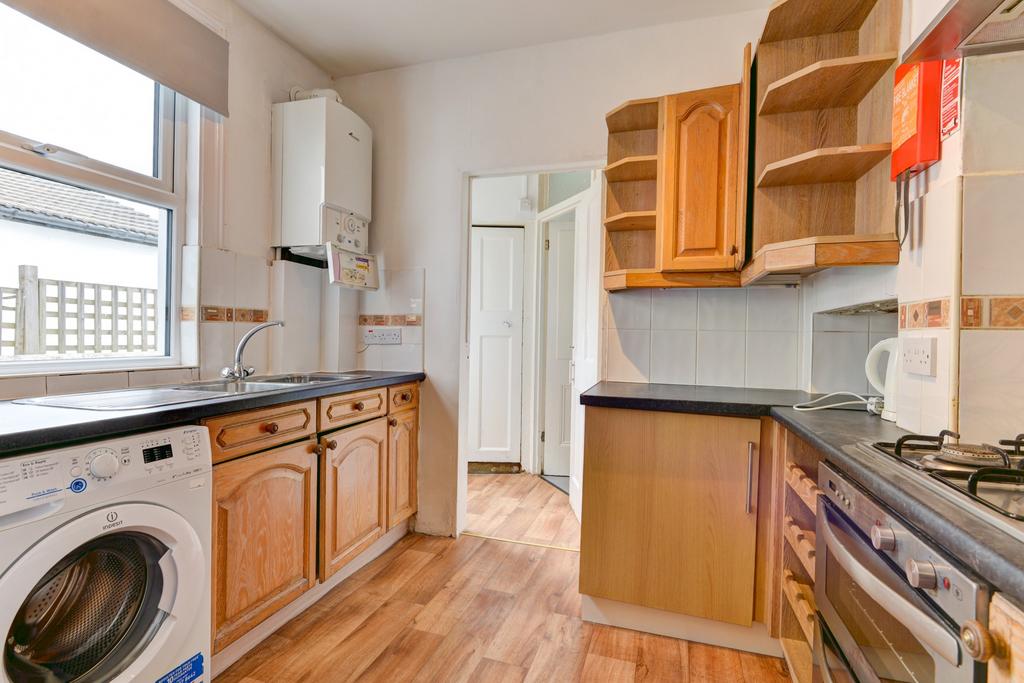 Bright and functional kitchen area with wooden ...