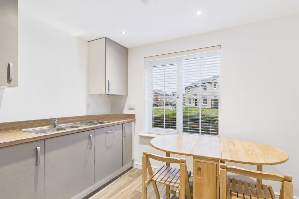 Light and airy with a big window and room for a ta