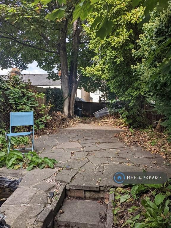 The Quiet Back Garden With a Feature Pond