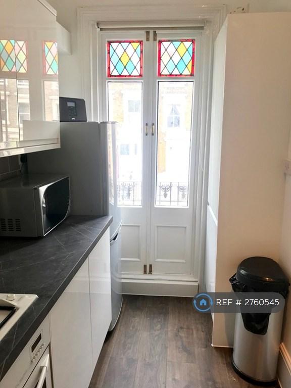 Doors Lead To a Small Standing Balcony