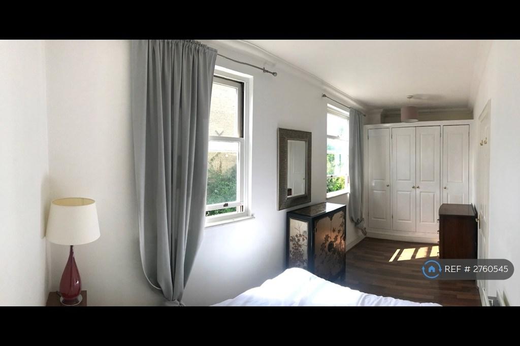 Main Bedroom With Built In Cupboards