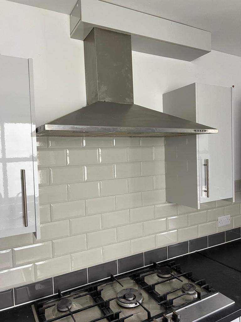 Contemporary kitchen with stainless-steel extra...