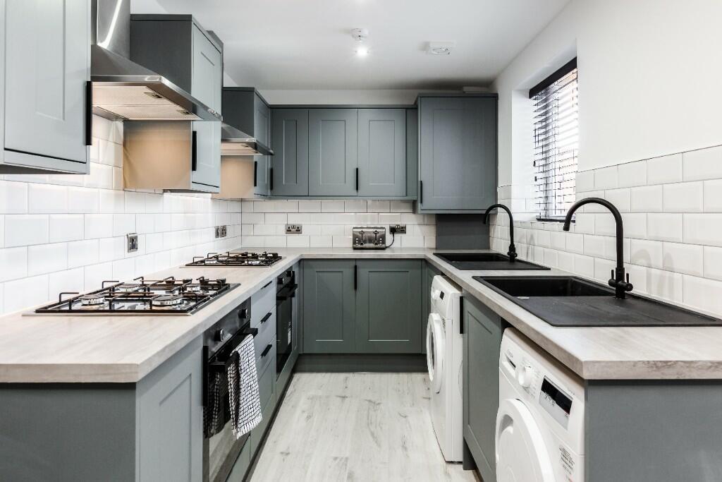 A modern and well-maintained kitchen featuring ...
