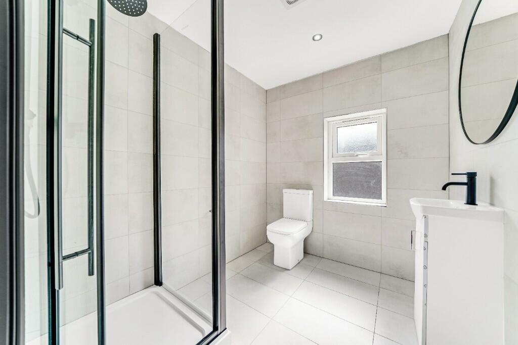 A modern, well-maintained bathroom featuring a ...