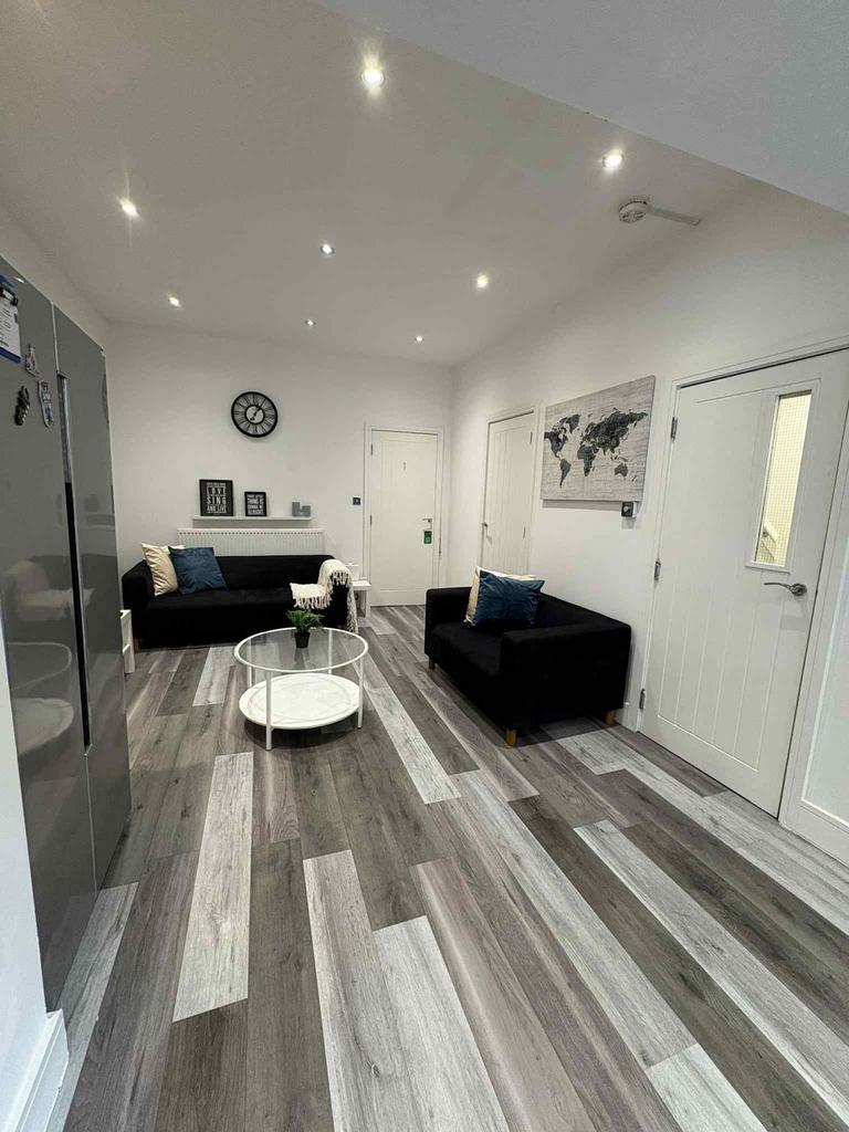 Modern and inviting living room featuring sleek...