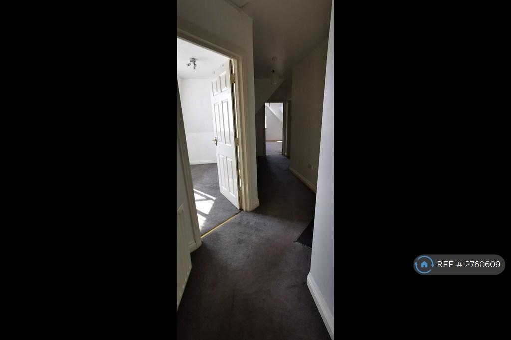 Corridor To Medium Size Bedroom Facing East