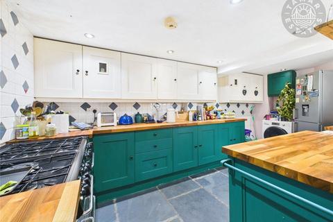 undefined, “An attractive four bedroom cottage boasting a substantial 0.06 acre plot and impressive rear garden.”